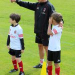 Stefano Eranio con bambini all'AC Milan Junior Camp Sporteventi