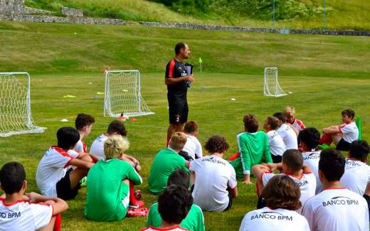 Luca Santochirico provides directions to the young player of the AC Milan Academy Camp