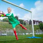 Goalkeeper save during the training session at AC Milan football summer camp