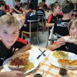 Due ragazzi al Milan Junior Camp nella sala da pranzo dell'albergo di Jesolo Lido (Venezia)