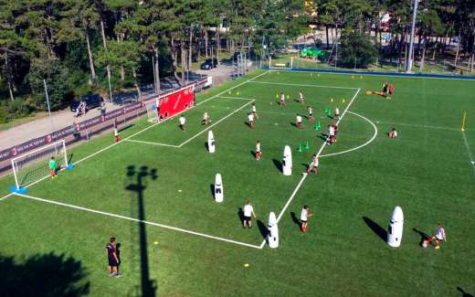 The football field of the Milan Junior Camp in the sports tourist village of Lignano Sabbiadoro