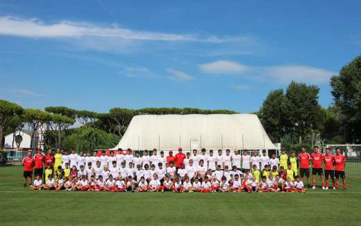 Young player of the AC Milan Camp on the soccer football field of Lido Jesolo (Venice)