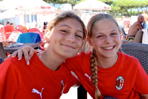 Girls making friends and having fun at the AC Milan summer soccer camps
