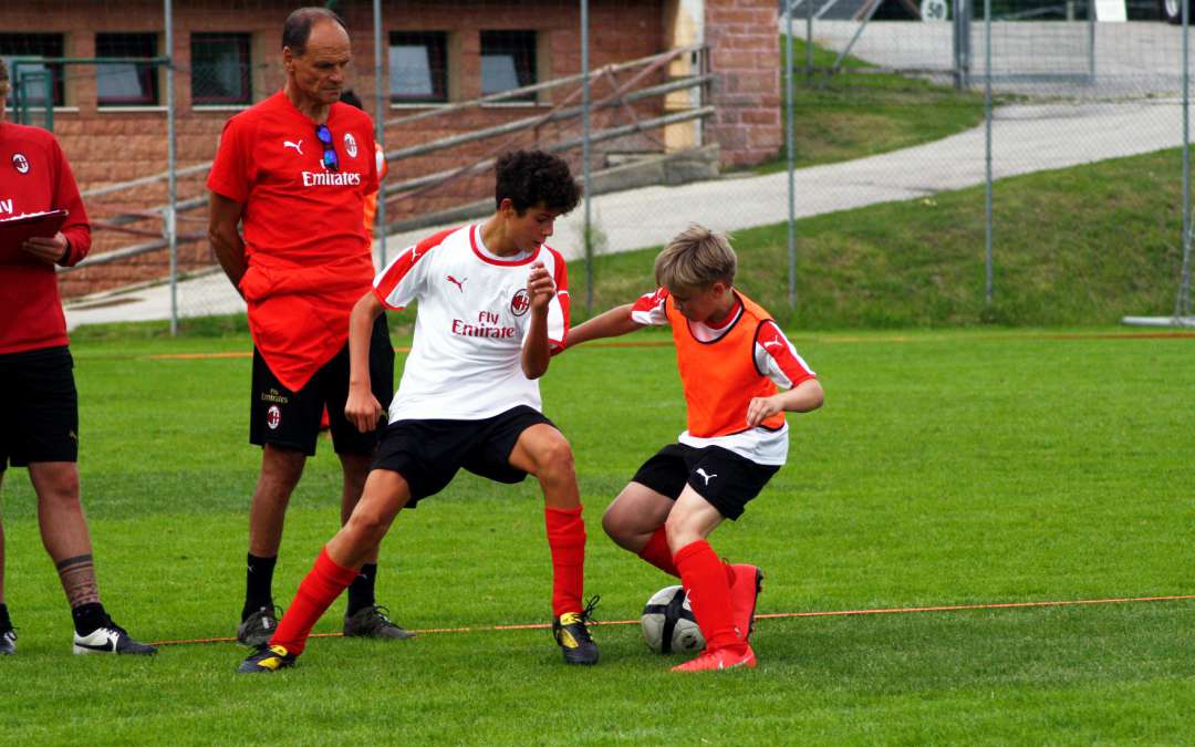 Walter De Vecchi follows two boys during training in the AC Milan Camp