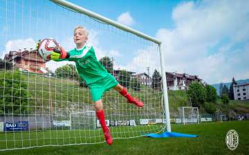Goalkeeper save during the training session at the AC Milan football summer camp