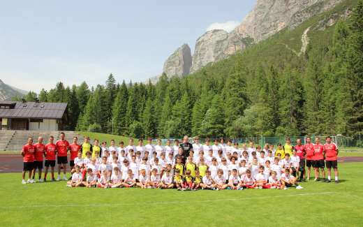 AC Milan Junior Camp’s young footballers on the soccer fields of Cortina d’Ampezzo in the Dolomites Alps
